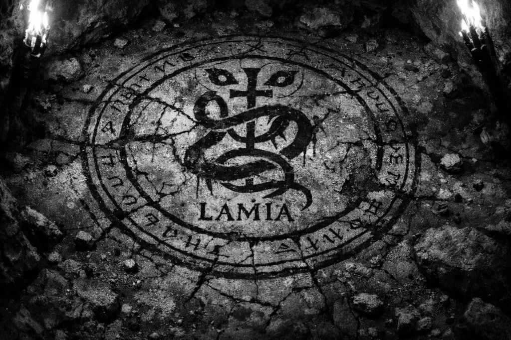 Stone floor sigil depicting Lamia’s seal carved into a cave floor